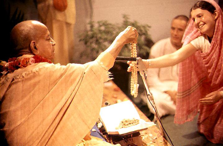 Prabhupada gives diksa initiation